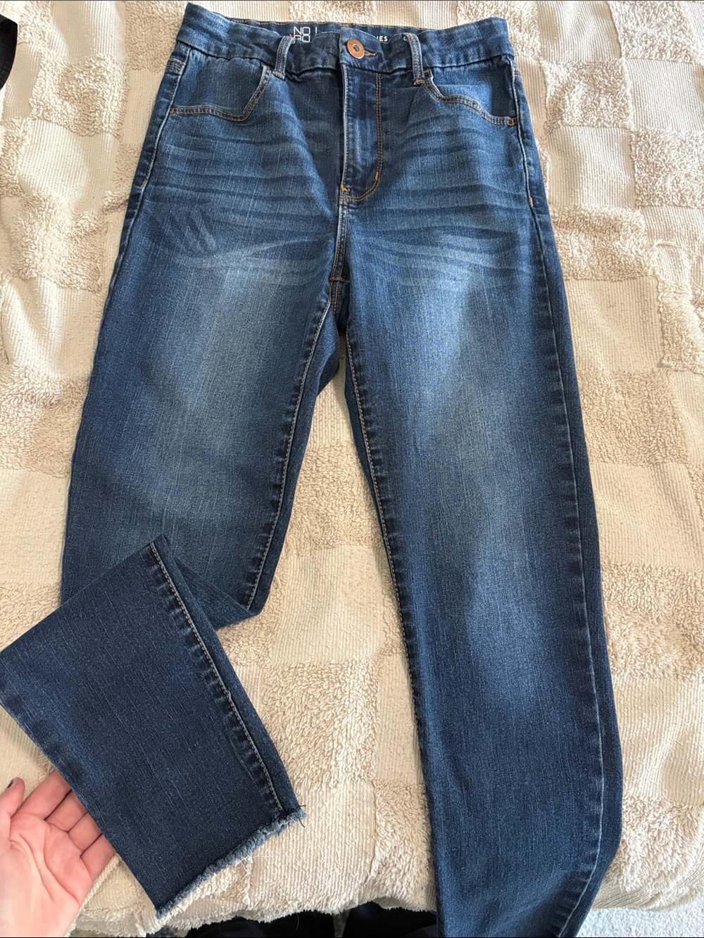 Stretched blue jeans